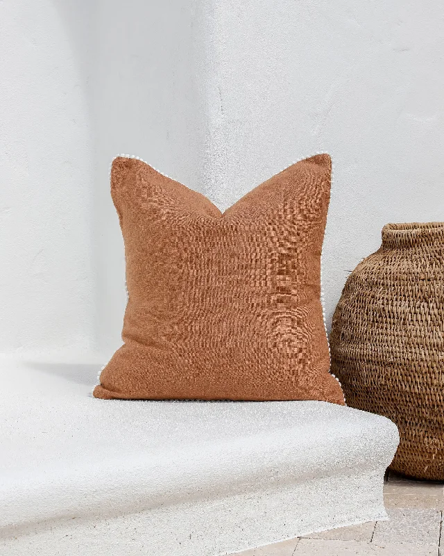 Grab It Now Cushion cover with pom poms in Cinnamon
